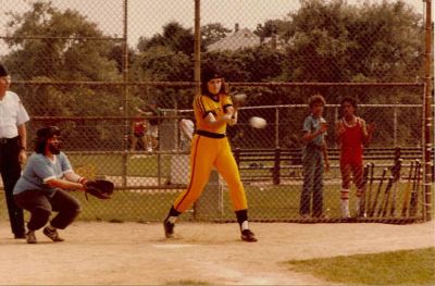 Teammate takes a swing

